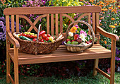 Basket with Lycopersicon (tomatoes), Capsicum (peppers)