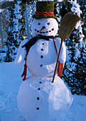 Snowman with moss cylinder and scarf