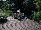 Wooden terrace with garden lamp