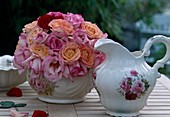 Rose bouquet in nostalgic chamber pot