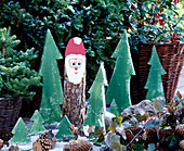 Fir trees and Father Christmas made of wood