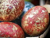 Easter eggs marbled with gold leaf