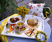 St. John's wort tea and wreath of St. John's wort flowers