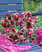 Wire wreath with flowers of Lathyrus (sweet pea), Gypsophila