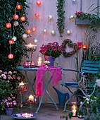 Fairy lights made of tissue paper balls with roses decoration