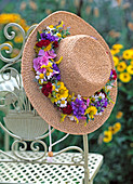 Straw hat with flower wreath