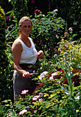 Woman cutting flowers