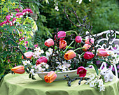 Arrangement of tulips and apple blossoms