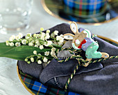 Convallaria majalis (Lily of the Valley) as napkin decoration Easter bunny