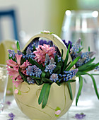 Vase in egg shape with Muscari (grape hyacinth)