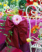 Festive dahlia table decoration on the terrace