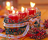 Multiflora rose, mini rosehips, candied jardiniere with candles, ribbon