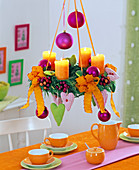 Chamaecyparis, hanging Advent wreath with orange candles