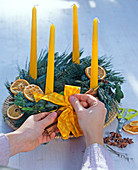 Advent wreath with orange slices and cinnamon (5/7)