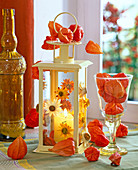 Lantern stuck with straw flowers