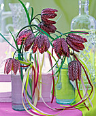 Fritillaria bouquet in small glass bottles