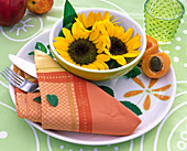 Helianthus annuus (sunflowers) in bowl