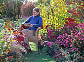 Autumn shrubs perennials seat woman
