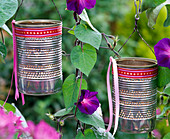 Homemade lanterns made of tin cans
