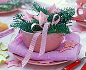 Abies procera (fir), pink stars, bow in pink bowl, pink napkin
