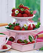 Fragaria in home-made cake stand made of upturned cups
