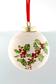 White Christmas tree ball with holly motif