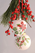 Christmas tree balls with holly motifs