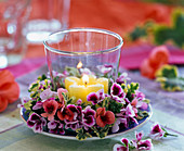 Lantern with wreath made of Pelargonium (geranium)