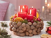 Floral foam in bowls with Juglans pinned as Advent wreath