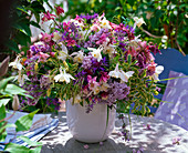 Bouquet made of Aquilegia, Syringa, Centaurea