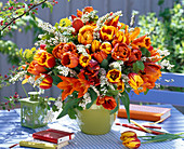 Bouquet of different Tulipa, Spiraea and Corylus