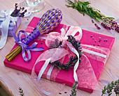 Gift wrapping: book wrapped in paper and decorated with Lavandula