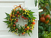 Door wreath of lycopersicon (tomatoes)