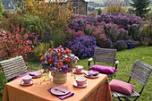 Set table at autumn bed