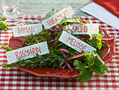 Bouquets of herbs with name tags