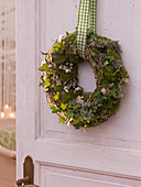 Door wreath of moss and ivy