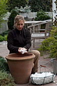 Putting styrofoam into tubs