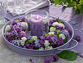 Candle wreath made of syringa (lilac) and viburnum (snowball)