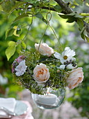 Jar of hermitage with flowers and herbs wreath