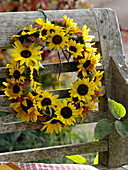 Autumn wreath of sunflowers and stonecrops