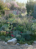 Gray bed with gravel border