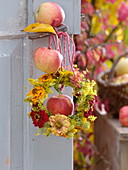 Small hanging wreath of zinnias and fennel