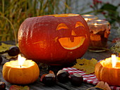 Pumpkins with faces and as tea light holders