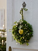 Door wreath from Pseudotsuga (Douglas fir) and Viscum album (Mistletoe)