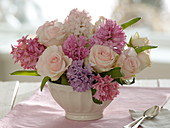 Small scented bouquet of Hyacinthus (hyacinths) and Rosa (roses)
