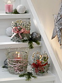 Christmas stair decoration with decorated lanterns