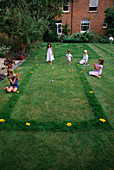 CHILDRENS SUMMER Party: HAZEL, Robert, HARRIET AND JOSHUA PLAYING Boules