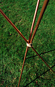 Designer: Clare MATTHEWS: FUNKY BIRD FEEDER PROJECT - COPPER TUBES TIED TOGETHER with String