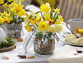 Daffodils Easter table decoration on the terrace