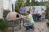 Pizza party on wooden terrace